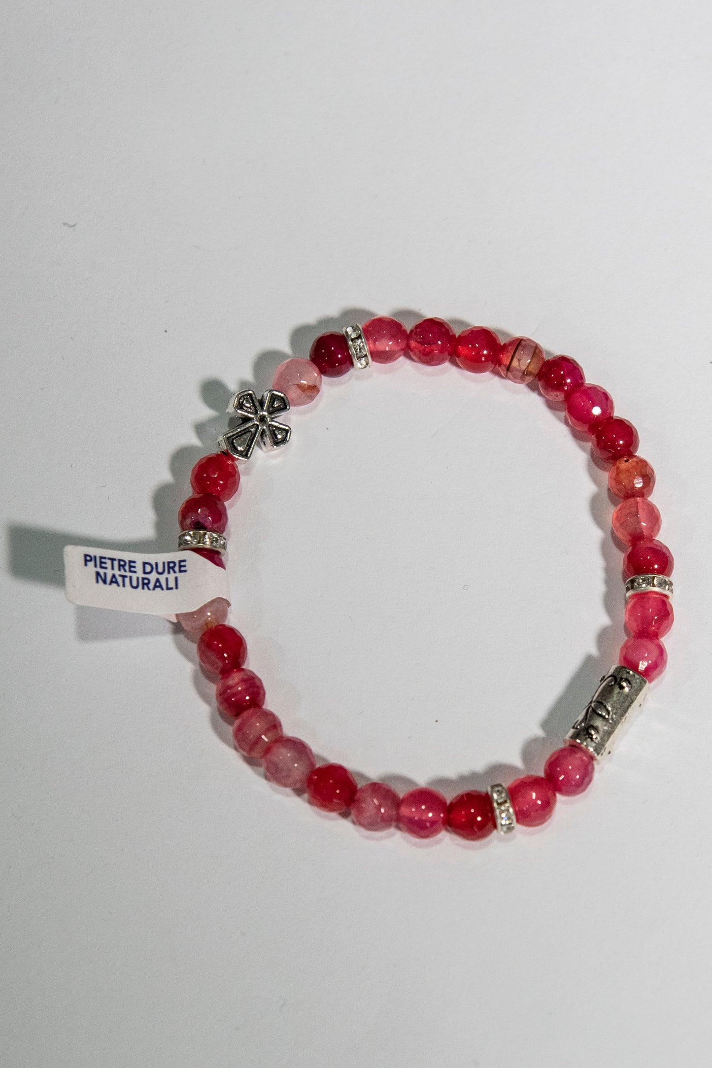 Bracciale elastico con grani in vetro tondo e varie sfumature di rosso - Magnificat